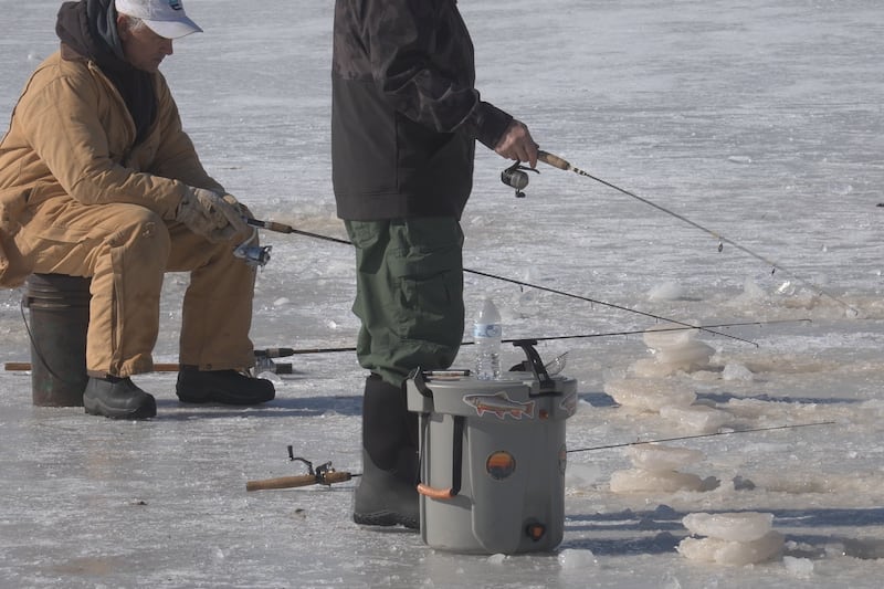 Ravenswood residents are enjoying the cold weather by going ice fishing.