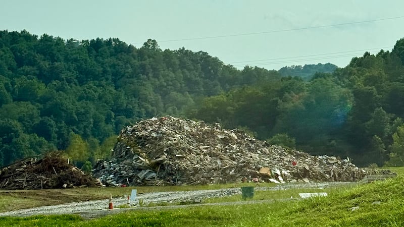 A large pile of debris sits at the intersection of I-79 and Route 33 after devastating...