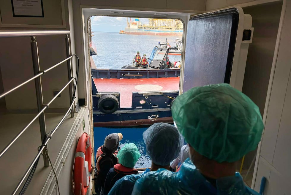 Passengers are being disembarked from the hantavirus-stricken cruise ship MV Hondius at the...